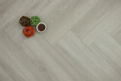 Supremo Luxury Click Vinyl Rigid Core Herringbone Flooring Graphite With Built In Underlay 6mm By 127mm By 610mm